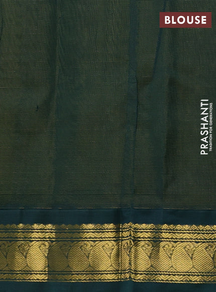Silk cotton saree mehendi green and bottle green with plain body and paisley zari woven korvai border