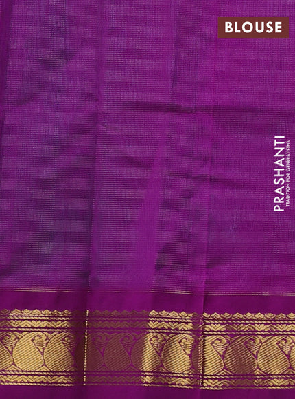 Silk cotton saree teal green and purple with plain body and paisley zari woven korvai border
