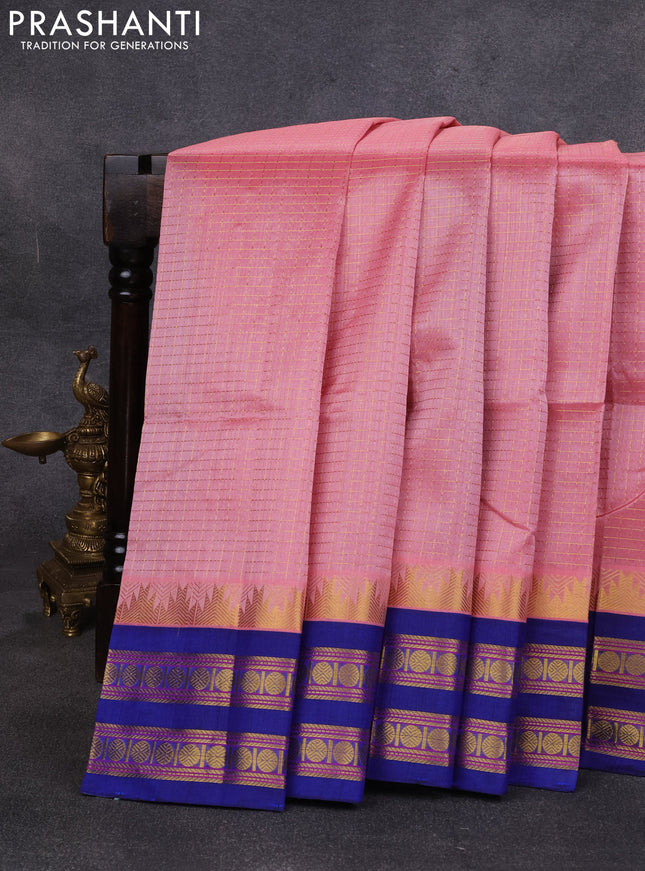 Silk cotton saree peach pink and navy blue with allover zari checked pattern and temple design rettapet zari woven korvai border