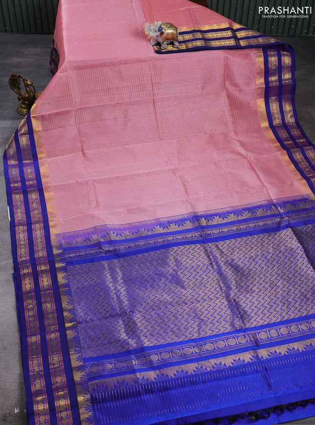 Silk cotton saree peach pink and navy blue with allover zari checked pattern and temple design rettapet zari woven korvai border