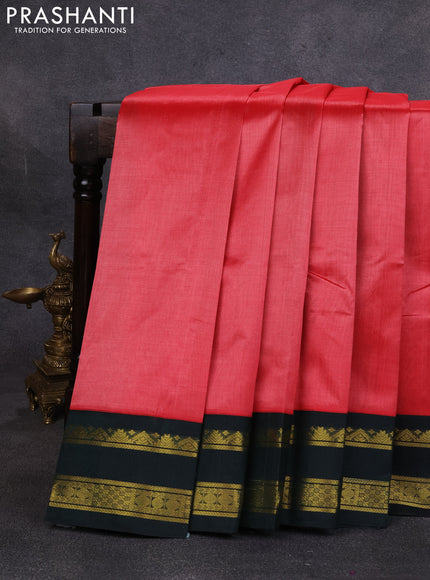 Silk cotton saree dark peach and bottle green with plain body and temple design rettapet zari woven korvai border