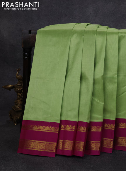 Silk cotton saree pista green and purple with plain body and temple design rettapet zari woven korvai border