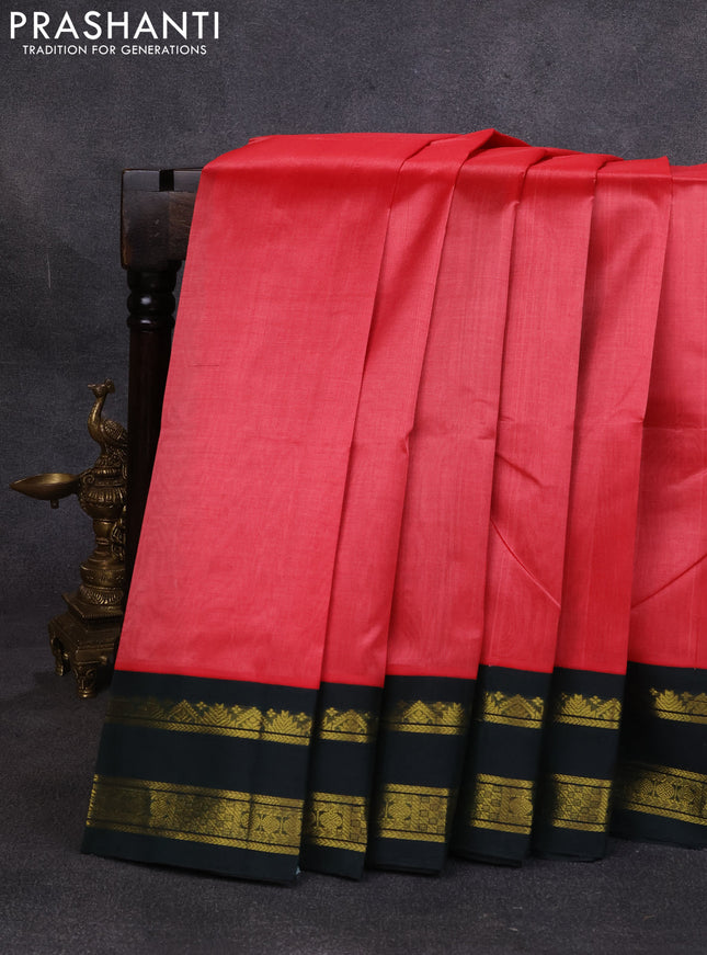Silk cotton saree dark peach and bottle green with plain body and temple design rettapet zari woven korvai border