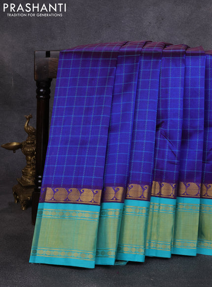 Silk cotton saree royal blue and teal green with allover thread checked pattern and paisley butta zari woven korvai border