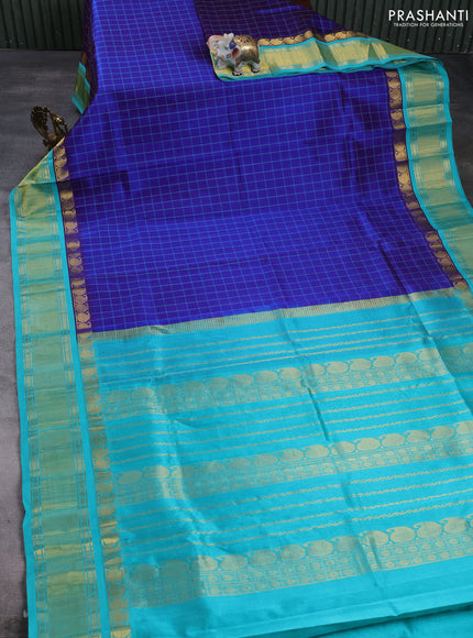 Silk cotton saree royal blue and teal green with allover thread checked pattern and paisley butta zari woven korvai border