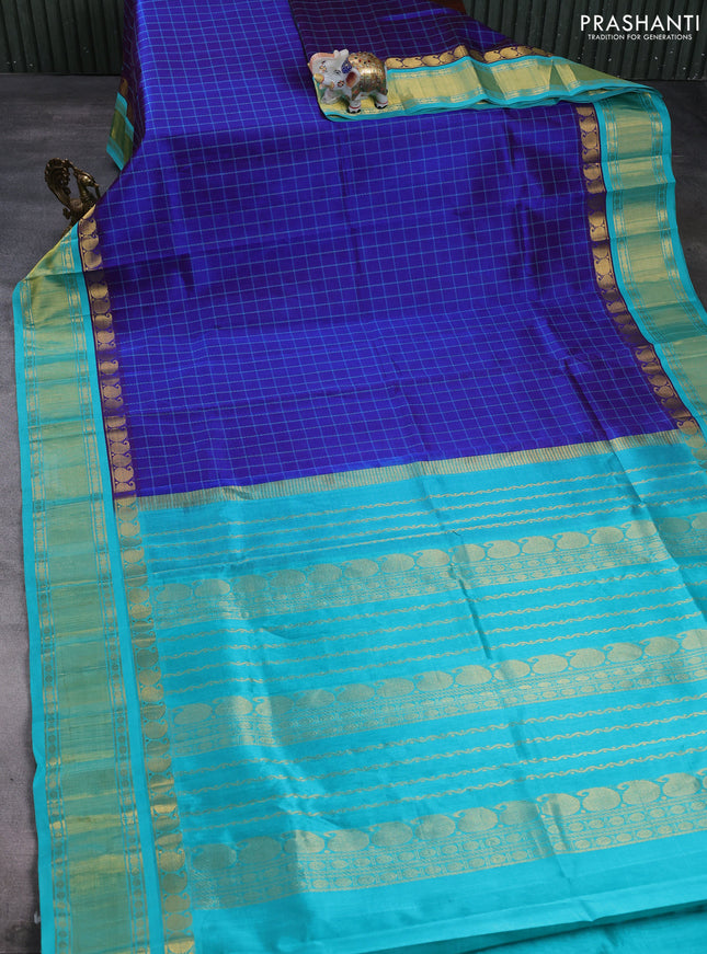 Silk cotton saree royal blue and teal green with allover thread checked pattern and paisley butta zari woven korvai border