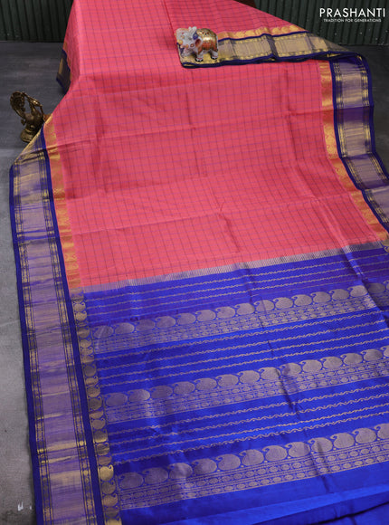 Silk cotton saree peach pink and navy blue with allover thread checked pattern and paisley butta zari woven korvai border