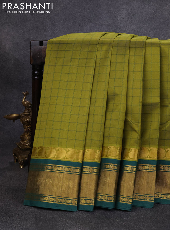 Silk cotton saree mehendi green and bottle green with allover thread checked pattern and paisley butta zari woven korvai border