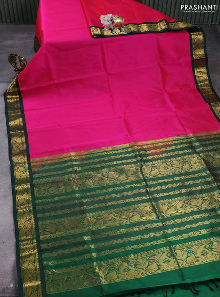 Silk cotton saree pink and green with plain body and paisley zari woven korvai border