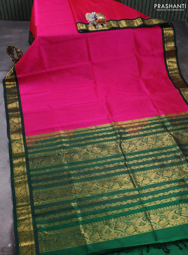 Silk cotton saree pink and green with plain body and paisley zari woven korvai border