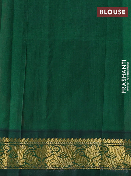 Silk cotton saree pink and green with plain body and paisley zari woven korvai border