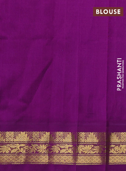 Silk cotton saree teal green and purple with plain body and temple design zari woven korvai border