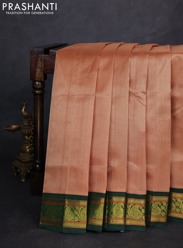 Silk cotton saree sandal and green with plain body and paisley zari woven korvai border