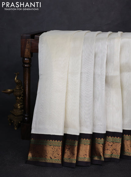 Silk cotton saree off white and deep maroon with plain body and zari woven elephant korvai border