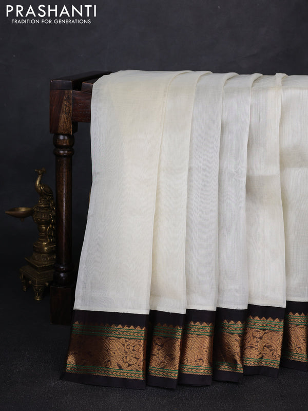 Silk cotton saree off white and deep maroon with plain body and zari woven elephant korvai border
