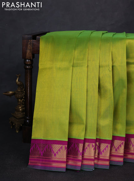 Silk cotton saree lime green and purple with plain body and temple design zari woven korvai border