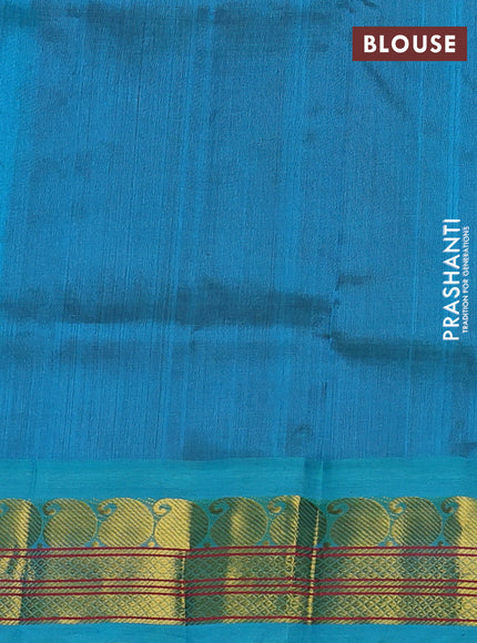 Silk cotton saree maroon and teal blue with plain body and paisley zari woven korvai border