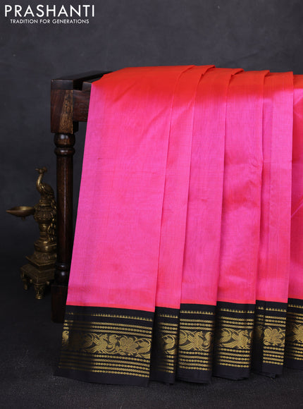 Silk cotton saree dark peach and black with plain body and zari woven korvai border