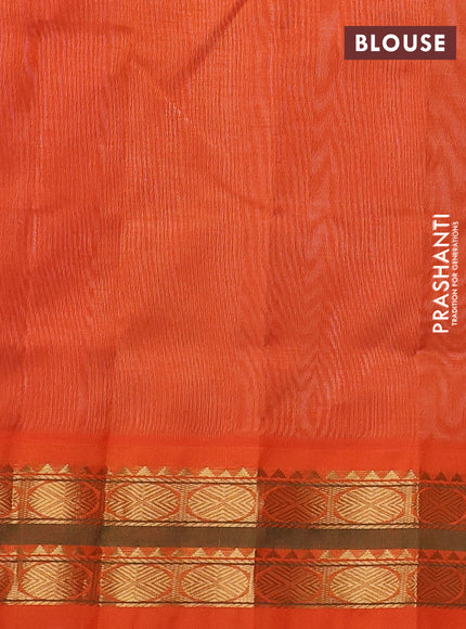 Silk cotton saree beige and orange with plain body and zari woven korvai border