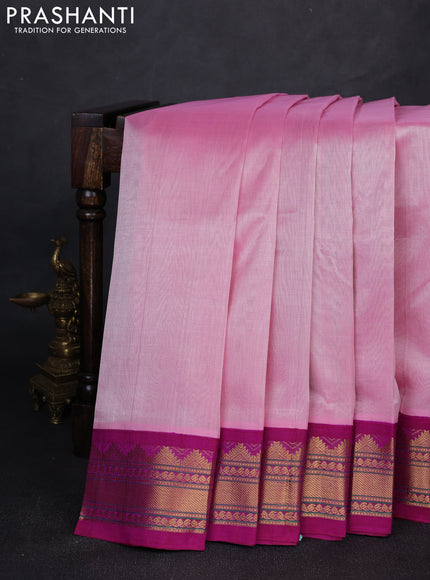 Silk cotton saree light pink and purple with plain body and temple design zari woven korvai border