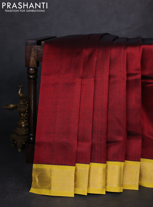 Silk cotton saree deep maroon and lime yellow with plain body and rudhraksha zari woven korvai border