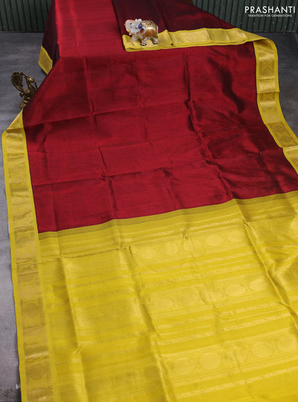 Silk cotton saree deep maroon and lime yellow with plain body and rudhraksha zari woven korvai border