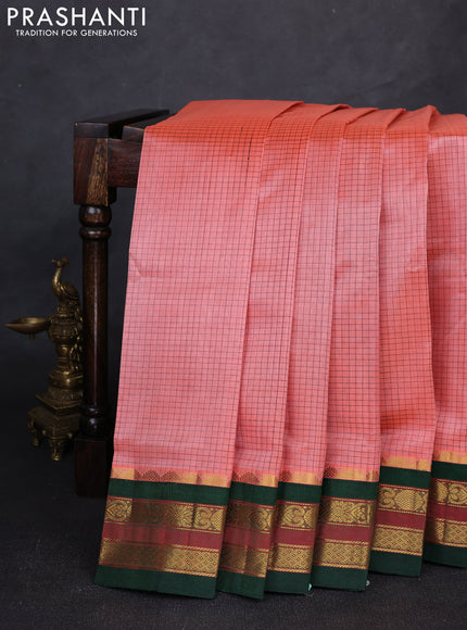 Silk cotton saree peach and bottle green with allover small zari checked pattern and zari woven korvai border