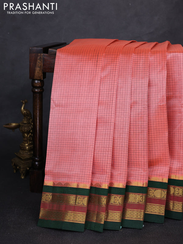 Silk cotton saree peach and bottle green with allover small zari checked pattern and zari woven korvai border