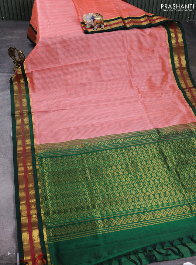 Silk cotton saree peach and bottle green with allover small zari checked pattern and zari woven korvai border
