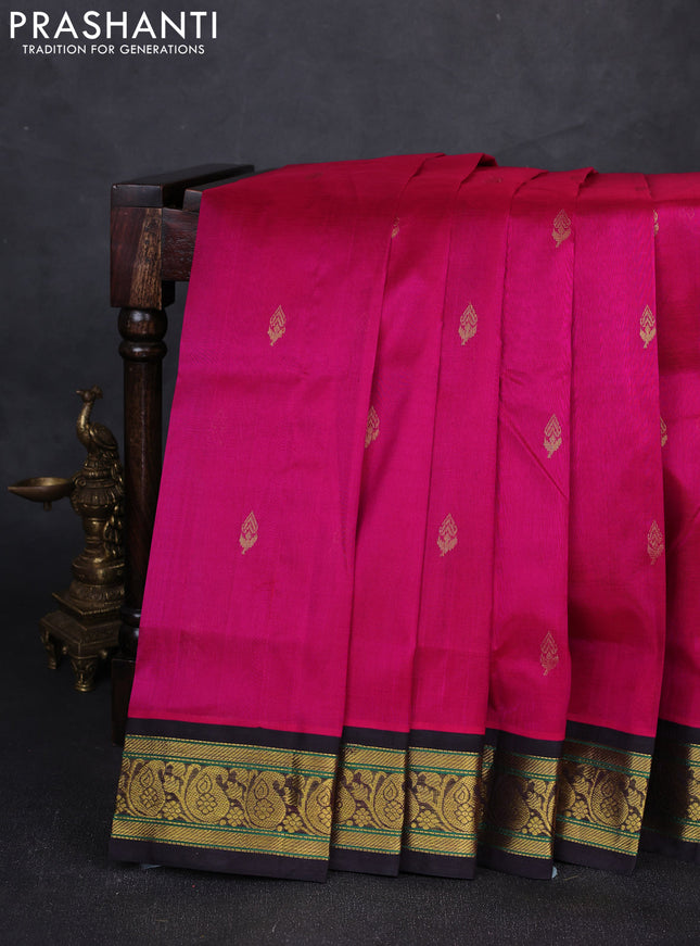Silk cotton saree pink and deep wine with allover zari woven buttas and paisley zari woven korvai border