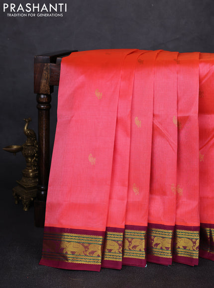 Silk cotton saree dark peach and purple with allover paisley zari woven buttas and zari woven elephant korvai border