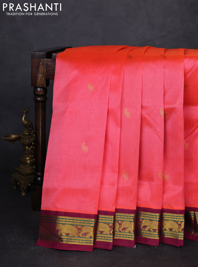 Silk cotton saree dark peach and purple with allover paisley zari woven buttas and zari woven elephant korvai border
