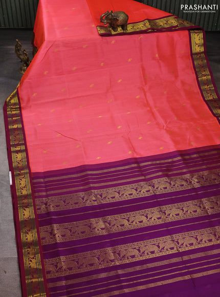 Silk cotton saree dark peach and purple with allover paisley zari woven buttas and zari woven elephant korvai border