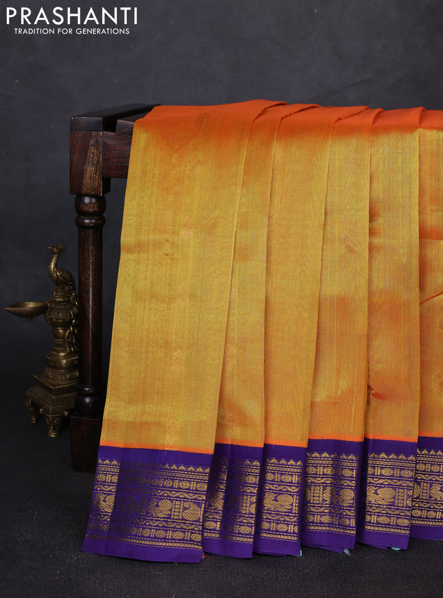 Silk cotton saree sunset orange and violet with allover zari woven buttas and zari woven korvai border