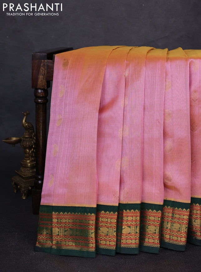 Silk cotton saree pink shade and bottle green with allover zari woven buttas and zari woven korvai border