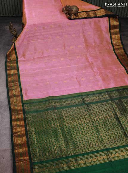 Silk cotton saree pink shade and bottle green with allover zari woven buttas and zari woven korvai border