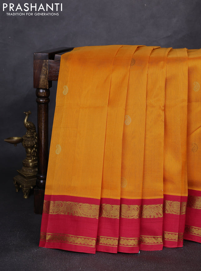 Silk cotton saree mango yellow and red with allover paisley zari woven buttas and rettapet zari woven korvai border