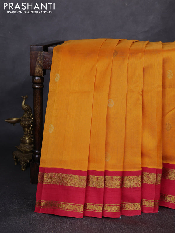 Silk cotton saree mango yellow and red with allover paisley zari woven buttas and rettapet zari woven korvai border