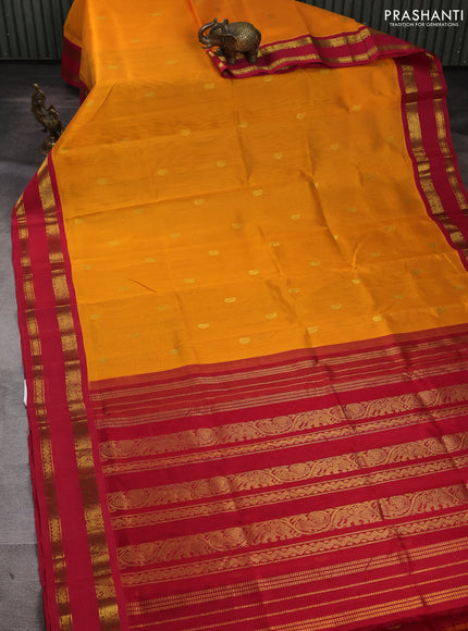 Silk cotton saree mango yellow and red with allover paisley zari woven buttas and rettapet zari woven korvai border