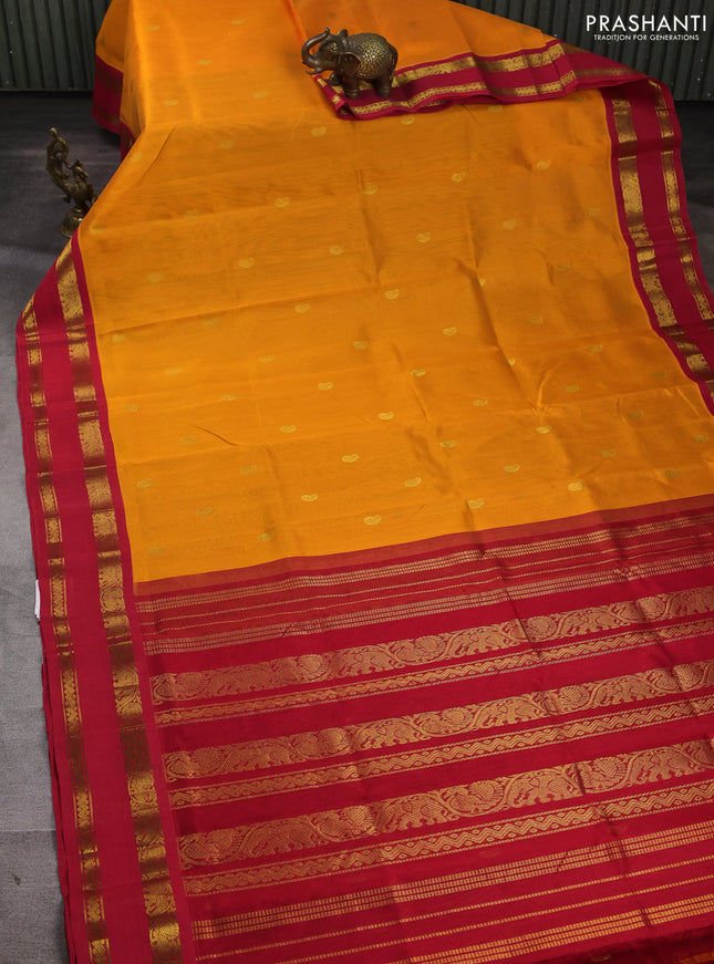 Silk cotton saree mango yellow and red with allover paisley zari woven buttas and rettapet zari woven korvai border