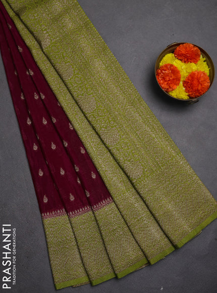 Banarasi semi crepe saree deep wine and light green with allover thread & zari woven buttas and woven border