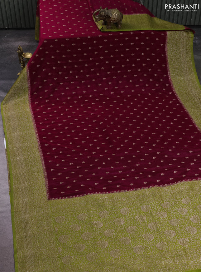 Banarasi semi crepe saree deep wine and light green with allover thread & zari woven buttas and woven border