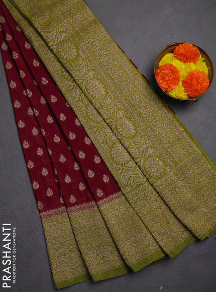 Banarasi semi crepe saree deep wine and mehendi green with allover thread & zari woven buttas and woven border