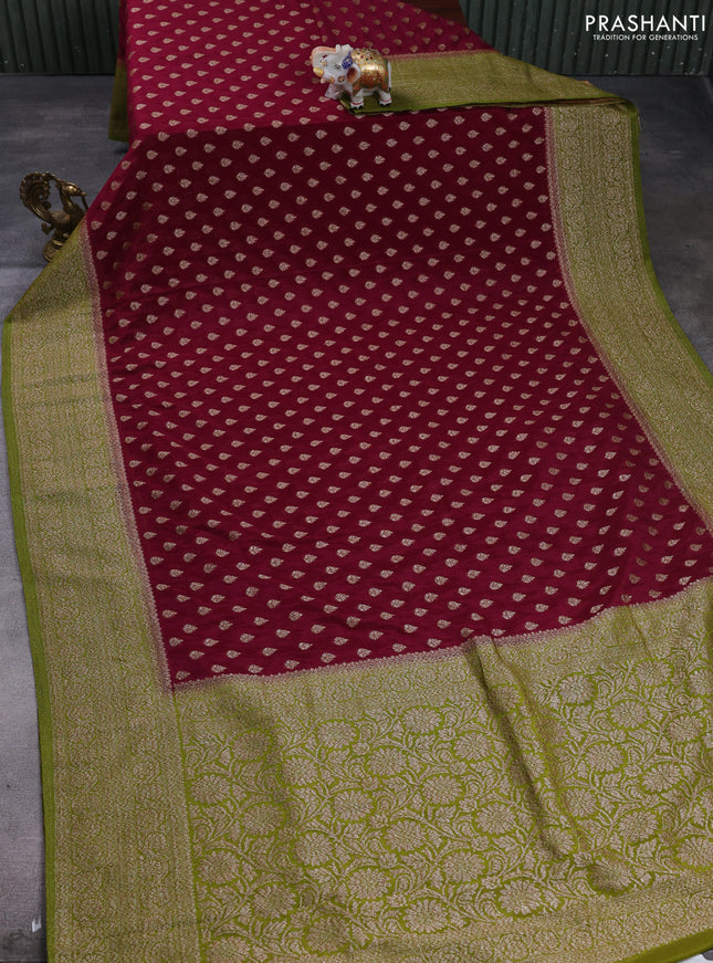 Banarasi semi crepe saree deep wine and mehendi green with allover thread & zari woven buttas and woven border