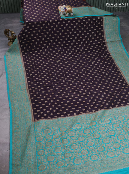 Banarasi semi crepe saree jamun shade and teal green with allover thread & zari woven buttas and woven border