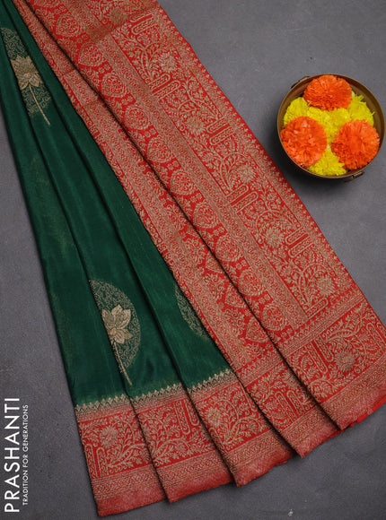 Banarasi semi crepe saree bottle green and rustic orange with thread & zari woven buttas and woven border
