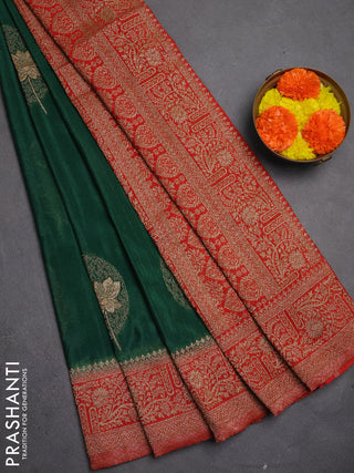 Banarasi semi crepe saree bottle green and rustic orange with thread & zari woven buttas and woven border