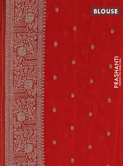 Banarasi semi crepe saree bottle green and rustic orange with thread & zari woven buttas and woven border