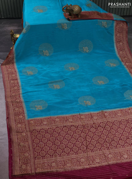 Banarasi semi crepe saree teal green and wine shade with thread & zari woven buttas and woven border