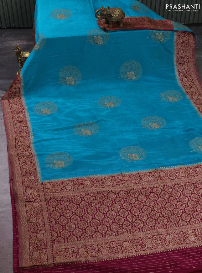 Banarasi semi crepe saree teal green and wine shade with thread & zari woven buttas and woven border